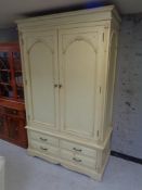 A contemporary double wardrobe fitted with four drawers CONDITION REPORT: 207 cm x