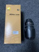 A Nikon AF-S 70 - 300 mm 1:4 5-5 6 G ED lens, with hood and both lens caps, boxed.