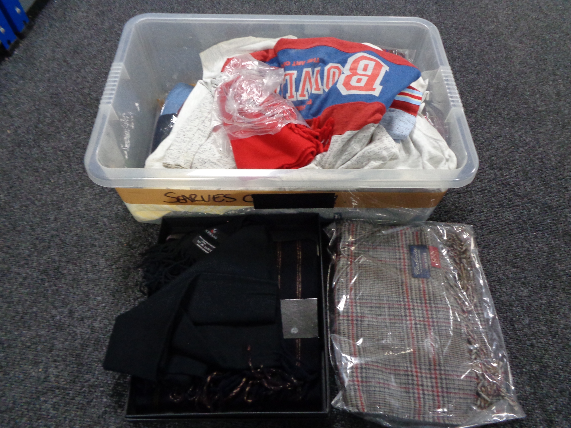 A crate of new and un-used clothing by Marks & Spencer, scarf sets,