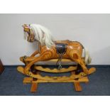 A good quality wooden rocking horse CONDITION REPORT: 112cm long by 41cm wide by
