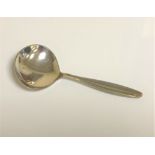 A Georg Jensen silver caddy spoon