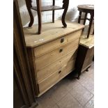 A nineteenth century pine four drawer chest