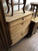 A nineteenth century pine four drawer chest