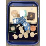 A tray of part Winston Churchill coin set, commemorative crowns,