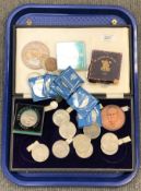 A tray of part Winston Churchill coin set, commemorative crowns,
