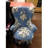 An early twentieth century floral upholstered bedroom chair
