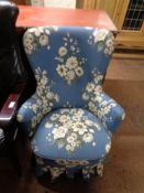 An early twentieth century floral upholstered bedroom chair