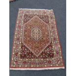 A Tabriz design rug,