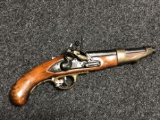 A twentieth century reproduction flintlock pistol (a/f)