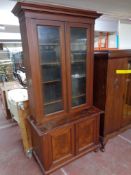 An nineteenth century mahogany bookcase CONDITION REPORT: 105cm wide by 52cm deep