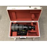 A Nikon AF-S Nikkor 500 mm 1:4 D II telephoto zoom lens, numbered 400017, on bracket,