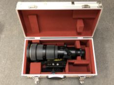 A Nikon AF-S Nikkor 500 mm 1:4 D II telephoto zoom lens, numbered 400017, on bracket,