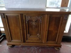 An early twentieth century oak sideboard CONDITION REPORT: 184cm long by 48cm wide