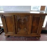 An early twentieth century oak sideboard CONDITION REPORT: 184cm long by 48cm wide