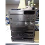 A four piece Yamaha stereo system with remote control CONDITION REPORT: This has not