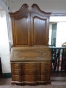 A 20th century oak bureau bookcase CONDITION REPORT: 120cm wide by 53cm deep by