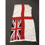 A British White ensign flag CONDITION REPORT: This measures 180cm by 93cm.