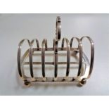 A large silver toast rack by Walker and Hall, 448.4g.