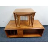 A nest of three inlaid mahogany tables on reeded legs together with an inlaid mahogany two tier