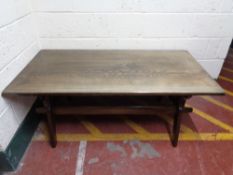 A heavy oak low refectory style coffee table