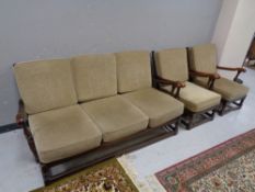 A wood framed three piece lounge suite