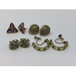 Four pairs of gold gem set earrings