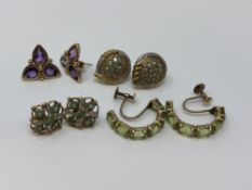 Four pairs of gold gem set earrings