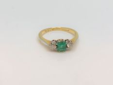 An antique 18ct yellow gold emerald and diamond ring, size J.