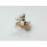 An 18ct gold pearl and diamond abstract ring,