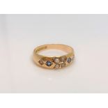 A 15ct gold sapphire and pearl ring, size K.