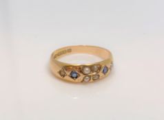 A 15ct gold sapphire and pearl ring, size K.