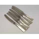 Six tea knives with mother of pearl handles, Sheffield 1938.