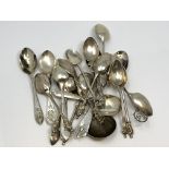 A collection of novelty and other silver spoons