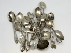 A collection of novelty and other silver spoons