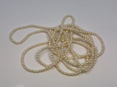 An approximately 95 inch strand of pearls