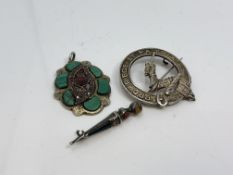 Two Scottish silver brooches and a pendant (3)