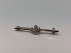 A white gold bar brooch set with old cut diamonds CONDITION REPORT: 2.4g Length 39.
