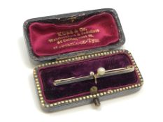 An 18ct gold platinum pearl and diamond brooch, 3g, boxed.