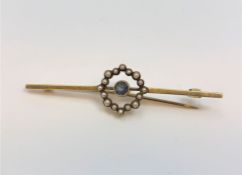 A 15ct gold antique pearl and sapphire brooch, width 57 mm.