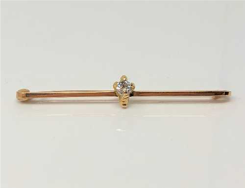 A 15ct gold brooch set with 0.25ct diamond, 3.5g.
