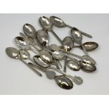 A collection of silver and other Golfing spoons