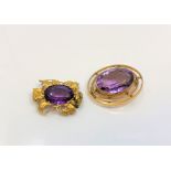 Two antique yellow metal brooches (lacking pins) mounted with amethysts, gross weight 8.8g.