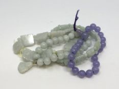 Four jade bracelets.