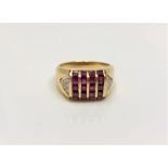 A good quality 18ct yellow gold ruby signet ring set with diamond shoulders, 7.1g, size N.
