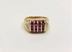 A good quality 18ct yellow gold ruby signet ring set with diamond shoulders, 7.1g, size N.