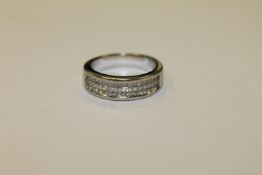 An 18ct white gold ring set with 54 princess cut diamonds