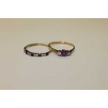 Two 18ct gold ruby and diamond rings, Both size T.