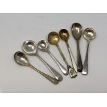 A selection of silver mustard spoons