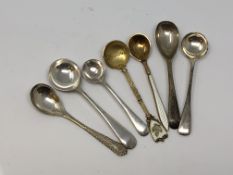 A selection of silver mustard spoons