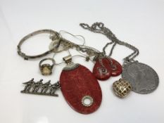 A collection of silver and white metal jewellery, coin on chain, ring etc.